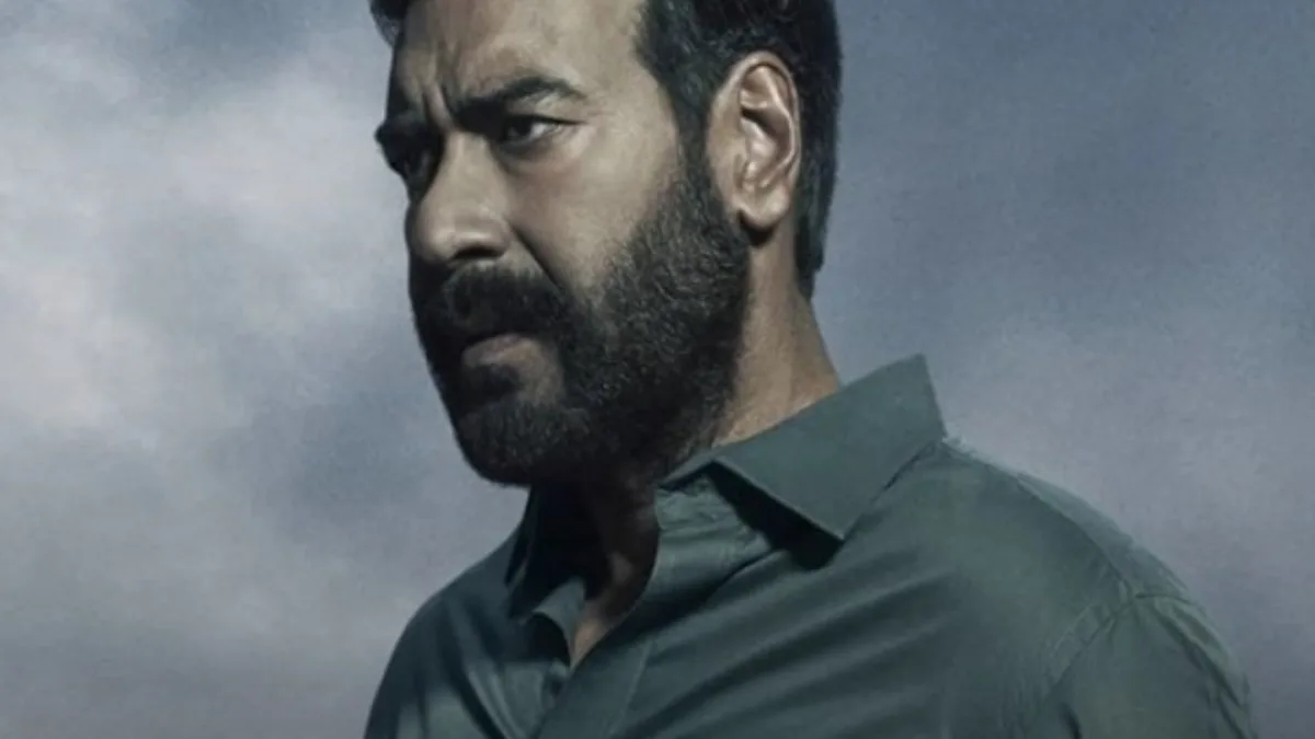 Bollywood film poster with a man in the center