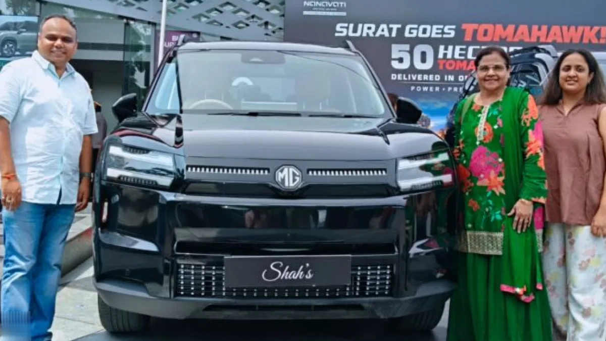 Electric SUV being handed over to a customer