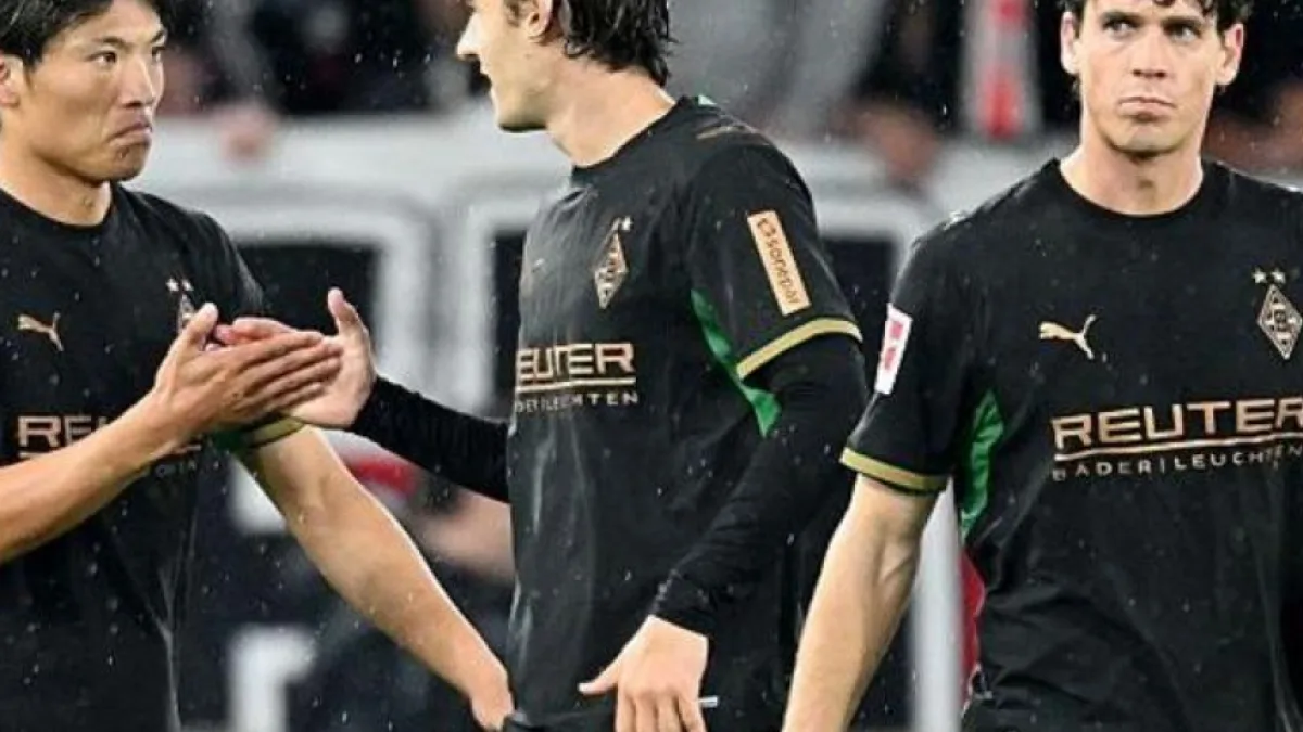 Football players in action during a match