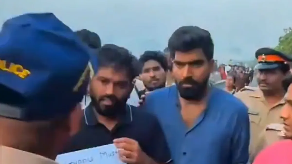 Protesters holding placards during a gathering