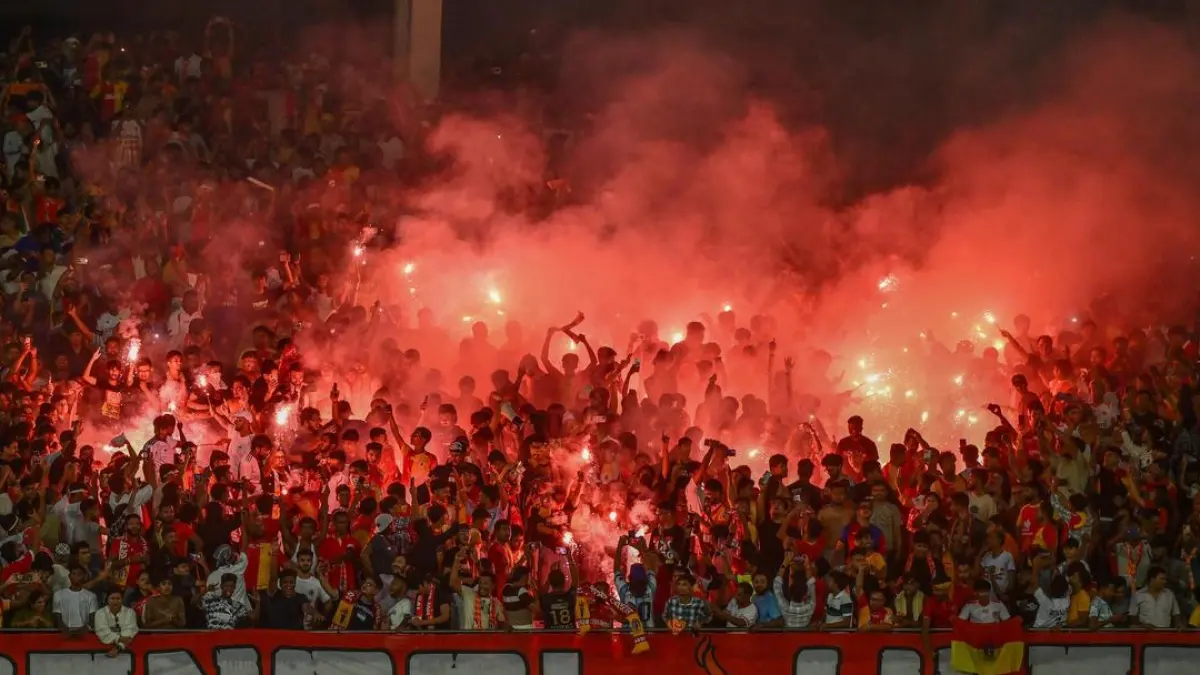 Football players in action during a match