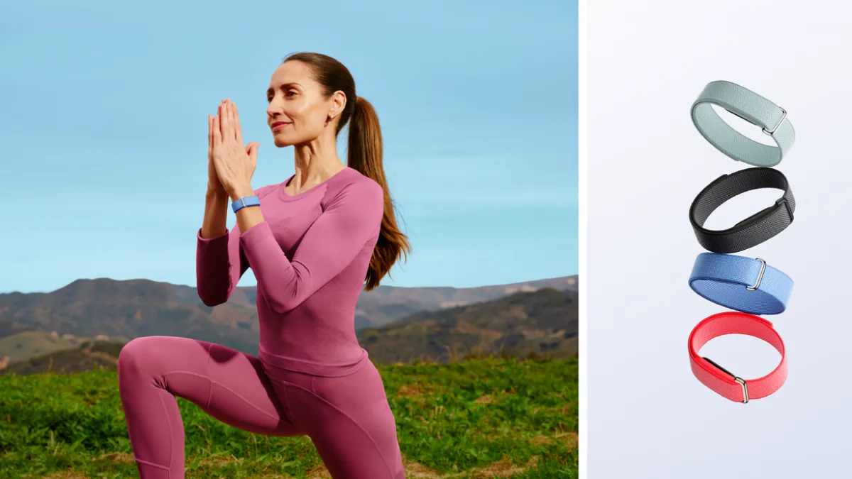 Person wearing a fitness tracker during a workout
