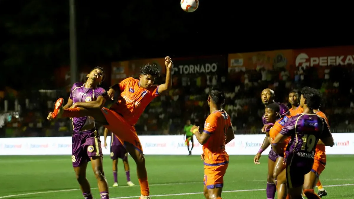 Football players in action during a match