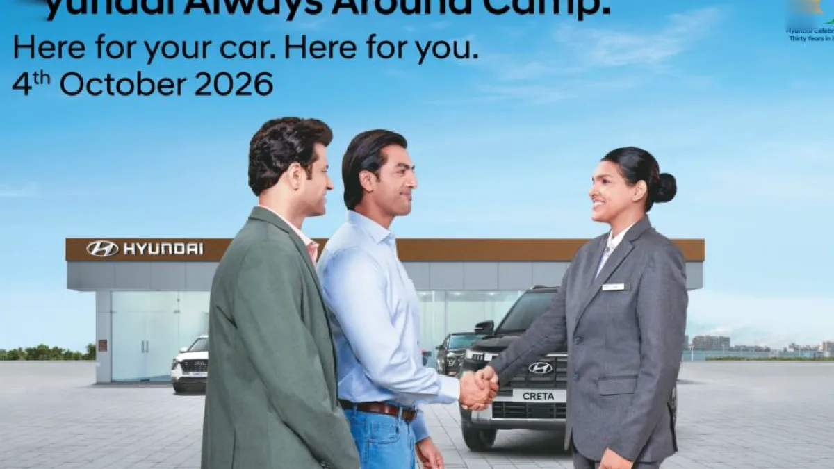 People gathered around a Hyundai vehicle