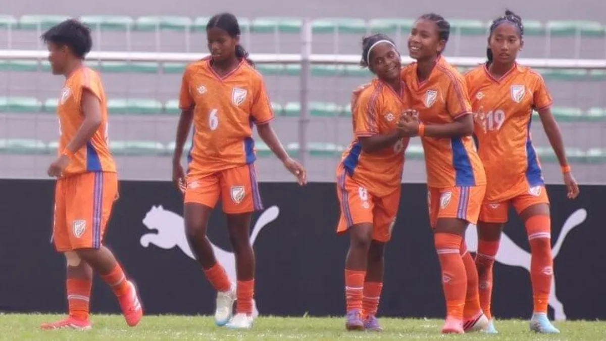 Football players in action during a match