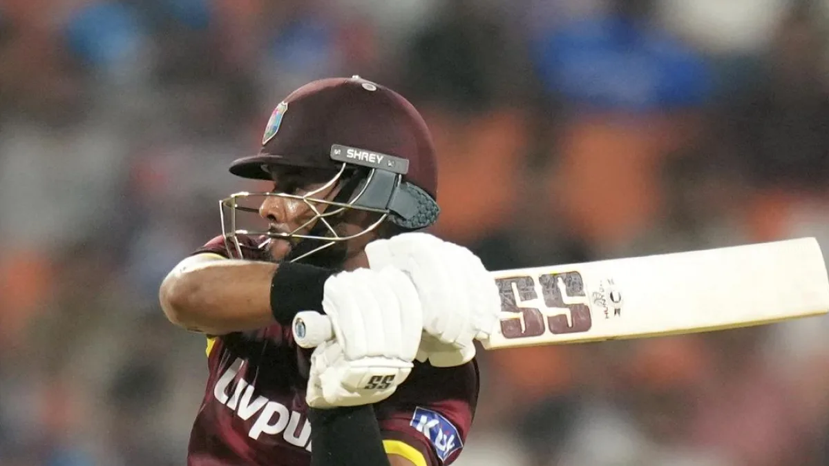 Cricket players in action on the field