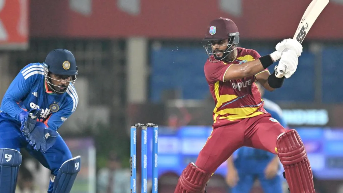 Cricket players in action during a T20I match