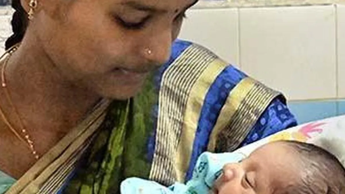 A new mother and her newborn at home
