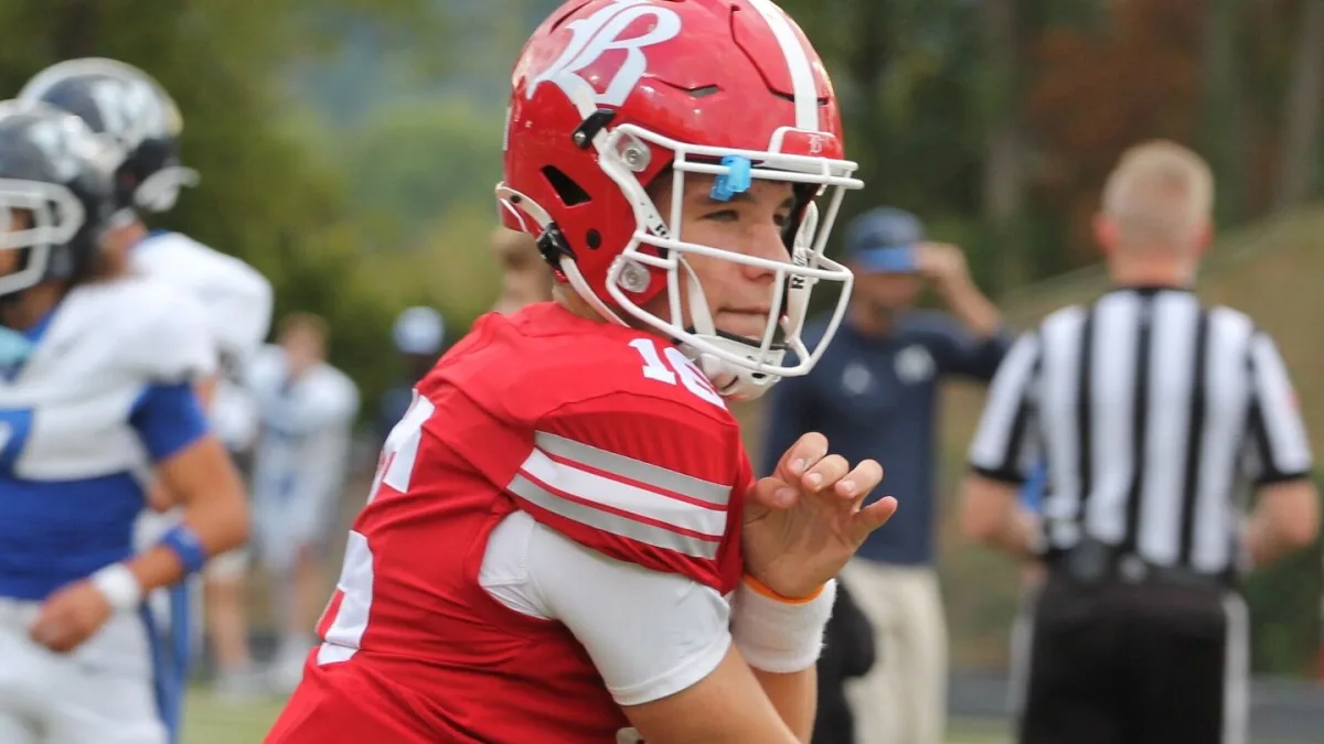 Young quarterback in action on the field