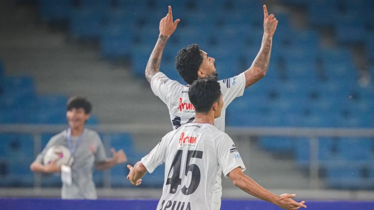 Football players in action during a match