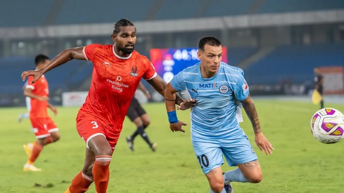 Football players in action during a match