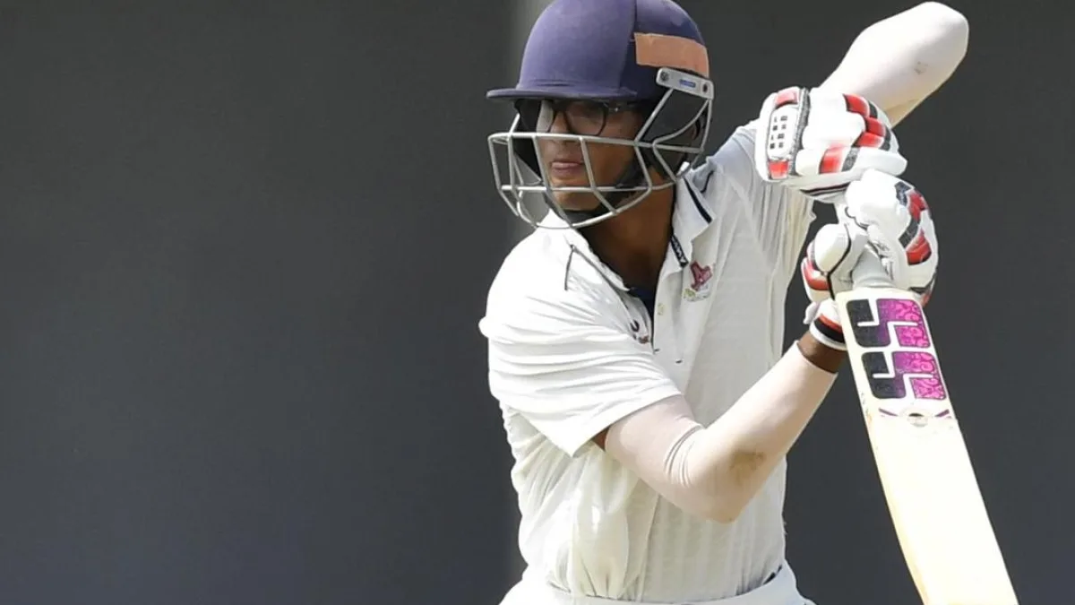 Cricket players in action during a match