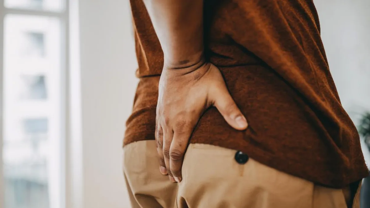 A person experiencing digestive discomfort